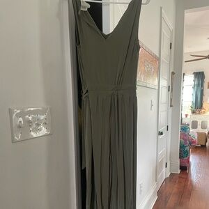 Cute army green jumpsuit with side belt. Flowy and silky.